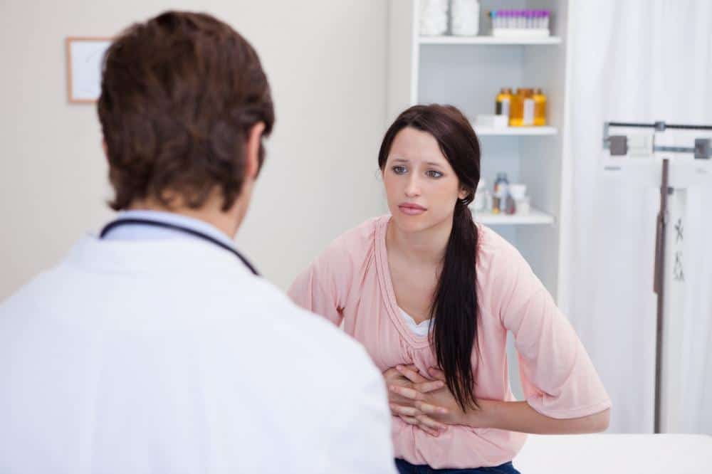 doctor prescribing adderall to a young female student