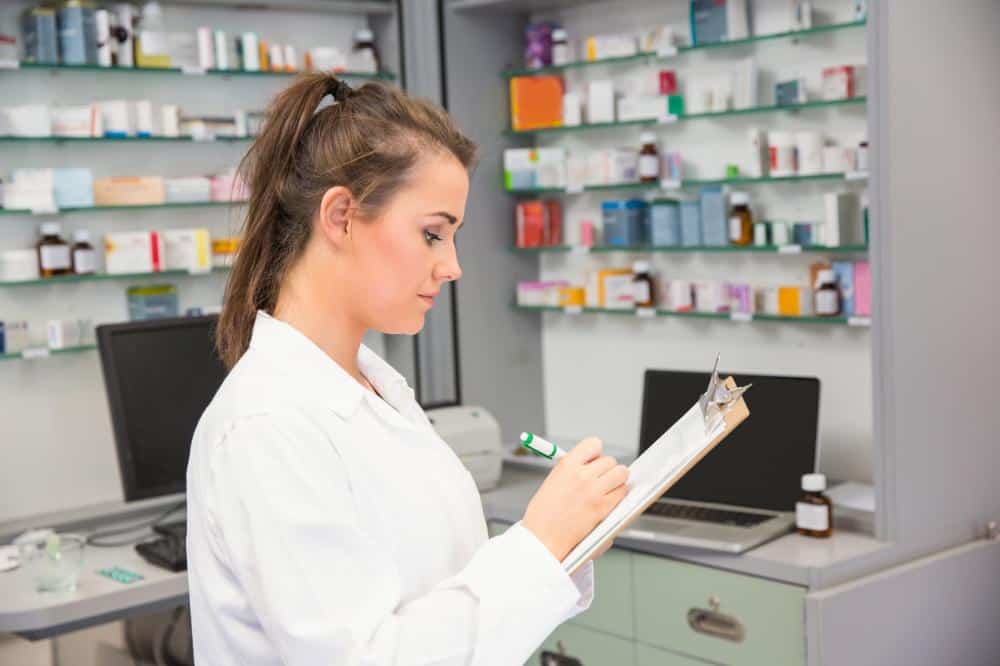 pharmacist checking products