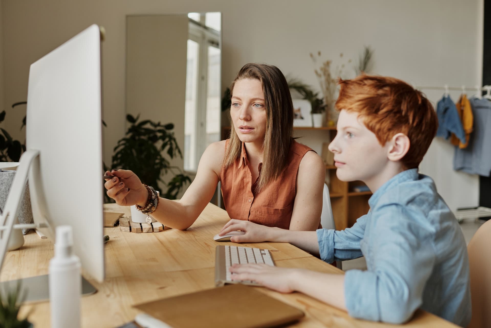 child and mom watching youtube