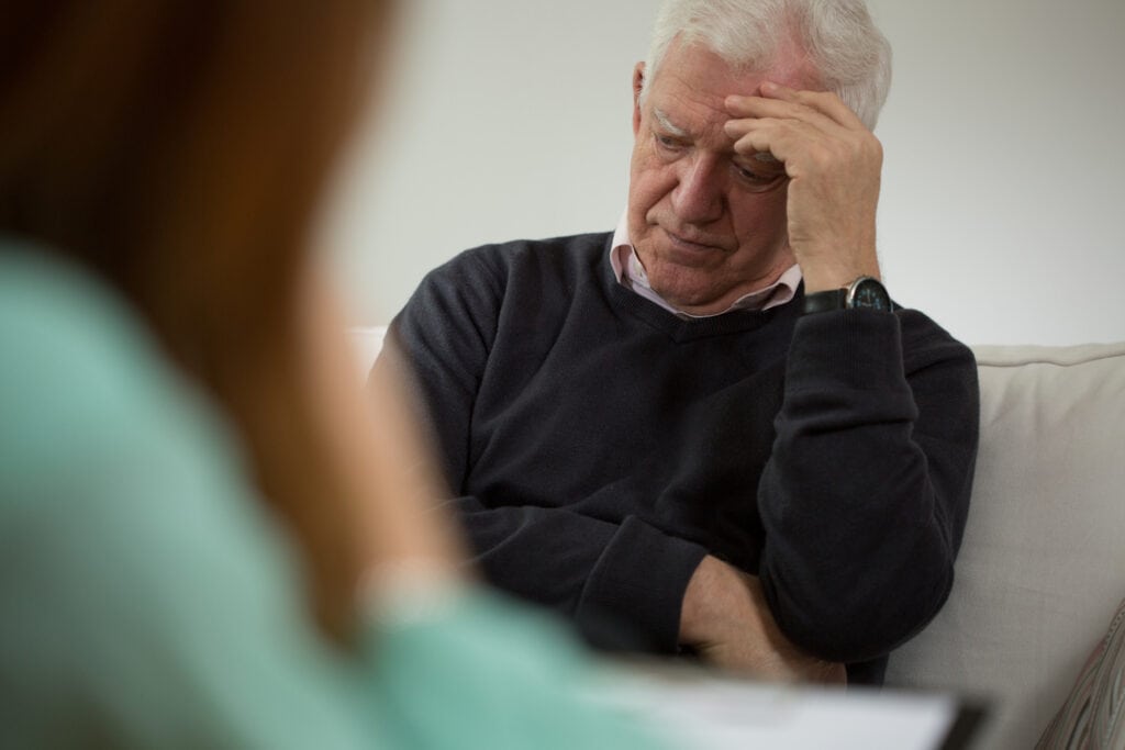 man in therapy dealing with dysthymia